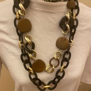 2 necklaces , gold and black , go well together or separate